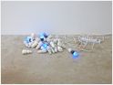 "Alfama" dimensions variable, porcelain/air-dry clay/black light bulbs/acrylic/electrical cords, 2015