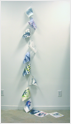 Untitled, inkjet prints on 12 tyvek sheets (each  8x10”) strung on nylon twine, total length approx 11’, 2009